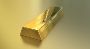 Precio del oro alcanza los 1.350 dólares por onza